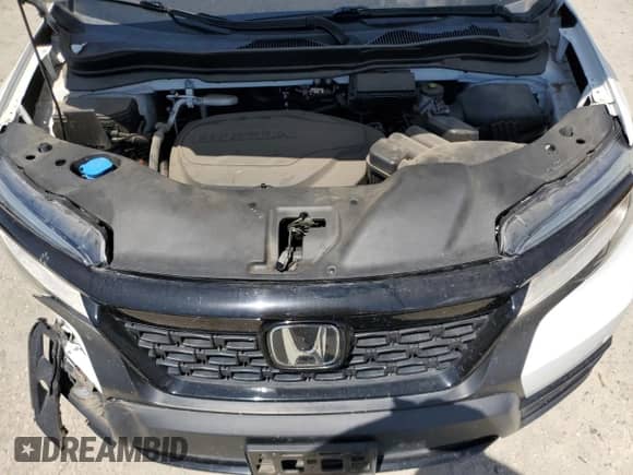 2021 Honda Passport Elite с VIN 5FNYF8H03MB007617, выставлен на аукционе Copart как лот 63036345 с пробегом 21 757 миль миль и Списание • Salvage title. История ставок и продаж доступна на DreamBid. Изображение 11.