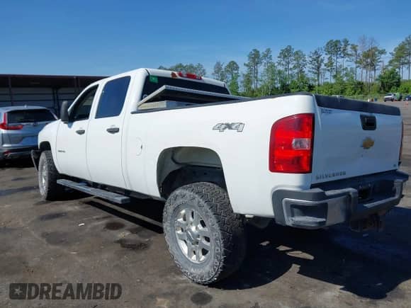 2013 Chevrolet Silverado 2500HD Work Truck with VIN 1GC1KVCG0DF124471, listed as a IAAI auction lot 42148880 with 262,027 mi miles and . Bid and sale history available at DreamBid. Image 3.