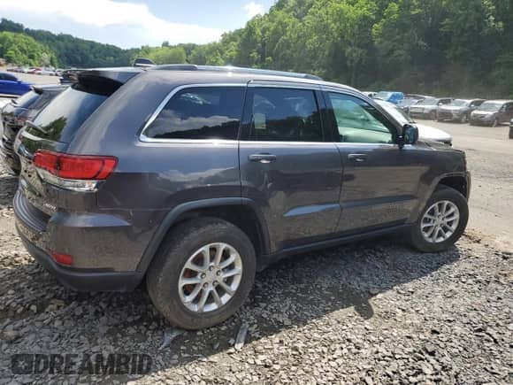 2021 Jeep Grand Cherokee Laredo E z VIN 1C4RJFAG1MC525298, wystawiony jako Copart lot #90879225 z przebiegiem 51 867 mil mil oraz Szkoda całkowita • Salvage title. Historia ofert i sprzedaży dostępna na DreamBid. Obrazek 3.