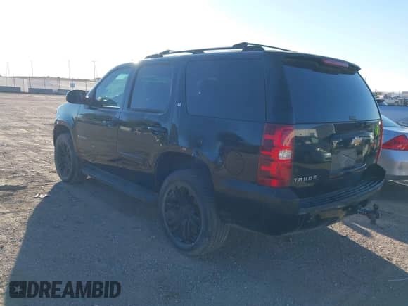 2007 Chevrolet Tahoe LTZ with VIN 1GNFK13027R249676, listed as a IAAI auction lot 43424132 with 296,751 mi miles and . Bid and sale history available at DreamBid. Image 3.