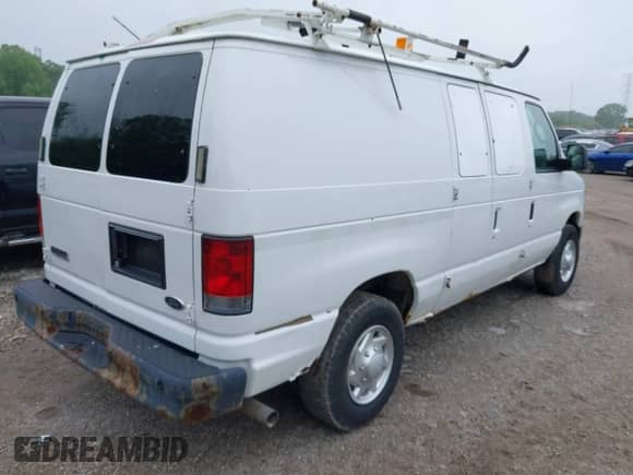 2012 Ford Econoline Cargo Recreational with VIN 1FTNE2EL7CDB36239, listed as a IAAI auction lot 42311374 with 152,547 mi miles and . Bid and sale history available at DreamBid. Image 4.