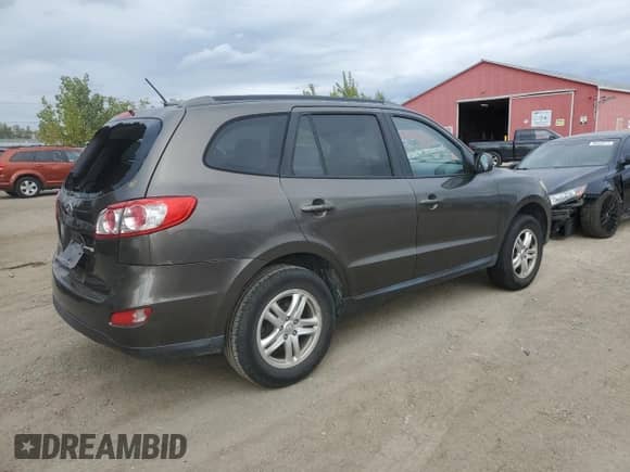 2012 Hyundai Santa Fe GLS с VIN 5XYZG4AGXCG137094, выставлен на аукционе Copart как лот 85352065 с пробегом 362 654 миль миль и Чистый • Clean title. История ставок и продаж доступна на DreamBid. Изображение 3.