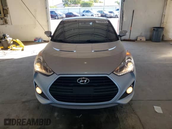 2014 Hyundai Veloster Turbo R-Spec с VIN KMHTC6AE9EU196937, выставлен на аукционе Copart как лот 70386975 с пробегом 150 522 миль миль и Чистый • Clean title. История ставок и продаж доступна на DreamBid. Изображение 5.