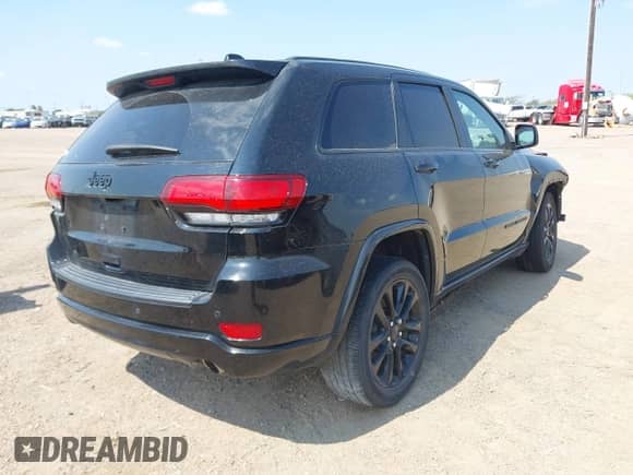 2021 Jeep Grand Cherokee Laredo E with VIN 1C4RJEAG8MC596881, listed as a IAAI auction lot 43050572 with 70,902 mi miles and . Bid and sale history available at DreamBid. Image 4.