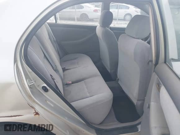 2004 Toyota Corolla CE with VIN JTDBR32EX42043375, listed as a IAAI auction lot 43285995 with Not provided miles and . Bid and sale history available at DreamBid. Image 8.