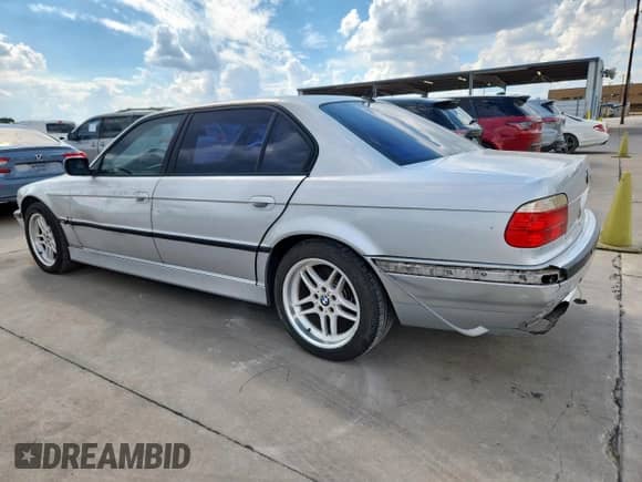2001 BMW 7 Series 740iL with VIN WBAGH83461DP31429, listed as a Copart auction lot 85560065 with 147,175 mi miles and Clean title. Bid and sale history available at DreamBid. Image 2.