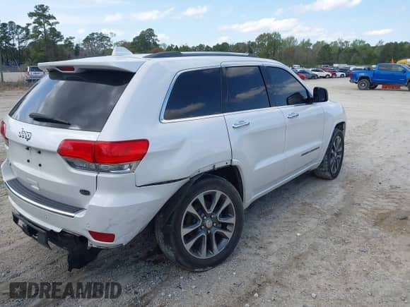 2018 Jeep Grand Cherokee Overland with VIN 1C4RJFCT4JC431275, listed as a IAAI auction lot 41931665 with 99,097 mi miles and . Bid and sale history available at DreamBid. Image 4.