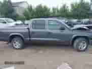 2003 Dodge Dakota Sport with VIN 1D7HL38X13S234210, listed as a IAAI auction lot 42913327 with 173,497 mi miles and . Bid and sale history available at DreamBid. Image 13.