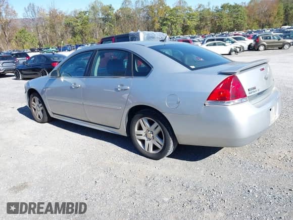 2011 Chevrolet Impala LT Fleet with VIN 2G1WG5EK9B1318812, listed as a IAAI auction lot 43521942 with 216,507 mi miles and . Bid and sale history available at DreamBid. Image 3.