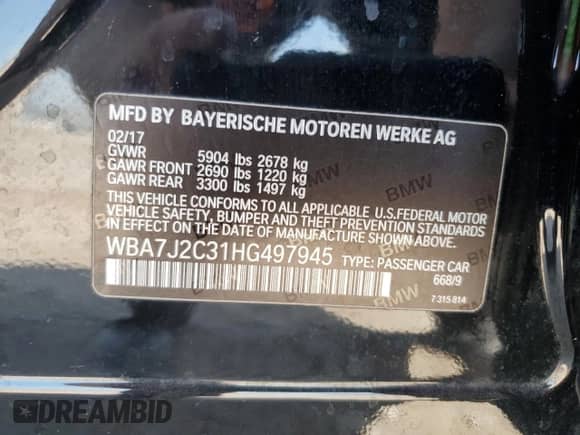 2017 BMW 7 Series 740e xDrive with VIN WBA7J2C31HG497945, listed as a Copart auction lot 80494365 with 54,846 mi miles and Salvage title. Bid and sale history available at DreamBid. Image 13.