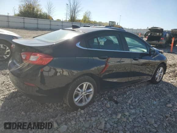 2017 Chevrolet Cruze LT z VIN 1G1BE5SM0H7264399, wystawiony jako Copart lot #82332055 z przebiegiem 97 477 mil mil oraz Nie do naprawy • Non repairable. Historia ofert i sprzedaży dostępna na DreamBid. Obrazek 3.