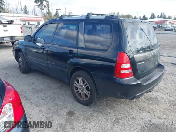 2005 Subaru Forester XT with VIN JF1SG69635H715044, listed as a IAAI auction lot 43180775 with 146,743 mi miles and . Bid and sale history available at DreamBid. Image 3.