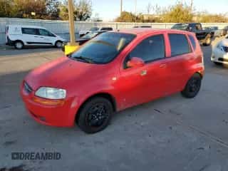 2006 Chevrolet Aveo LS z VIN KL1TD66686B671596, wystawiony jako Copart lot #76904744 z przebiegiem 234 892 mil mil oraz Szkoda całkowita • Salvage title. Historia ofert i sprzedaży dostępna na DreamBid. Obrazek 1.