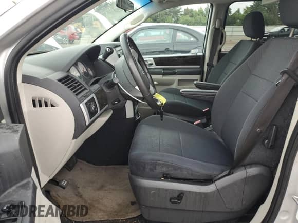 2010 Dodge Grand Caravan SXT с VIN 2D4RN5D18AR261427, выставлен на аукционе Copart как лот 71442315 с пробегом 177 644 миль миль и Списание • Salvage title. История ставок и продаж доступна на DreamBid. Изображение 7.