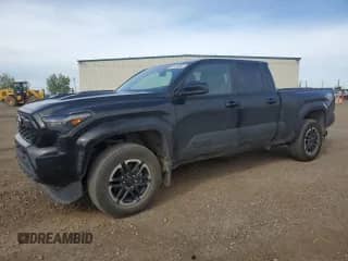 2024 Toyota Tacoma SR5 with VIN 3TYLB5JN2RT055045, listed as a Copart auction lot 69134065 with 25,584 mi miles and Salvage title. Bid and sale history available at DreamBid. Image 1.