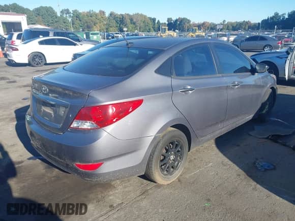2014 Hyundai Accent GLS with VIN KMHCT4AE9EU597960, listed as a IAAI auction lot 43476423 with 192,794 mi miles and . Bid and sale history available at DreamBid. Image 4.