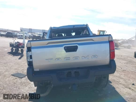 2024 Toyota Tacoma SR with VIN 3TYKD5HN4RT016047, listed as a IAAI auction lot 41335702 with Not provided miles and . Bid and sale history available at DreamBid. Image 16.