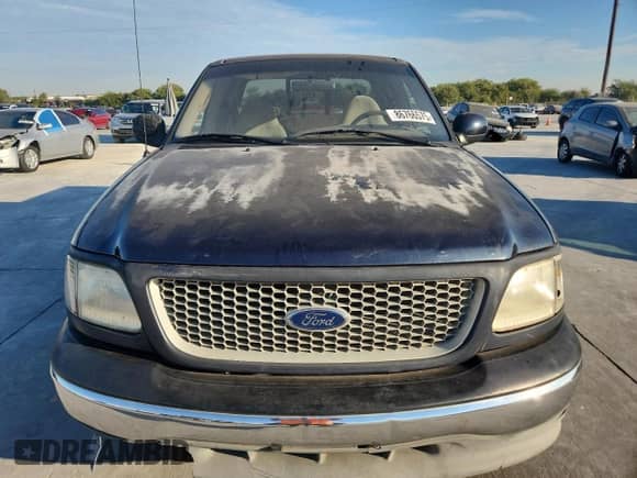 1999 Ford F-150 с VIN 1FTRX17W4XNB72337, выставлен на аукционе Copart как лот 86766575 с пробегом 183 712 миль миль и Чистый • Clean title. История ставок и продаж доступна на DreamBid. Изображение 5.