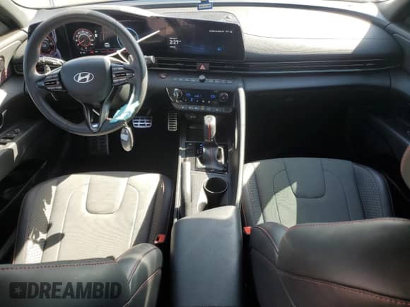 2025 Hyundai Elantra N Line z VIN KMHLR4DF1SU892971, wystawiony jako Copart lot #70555465 z przebiegiem 5 206 mil mil oraz Szkoda całkowita • Salvage title. Historia ofert i sprzedaży dostępna na DreamBid. Obrazek 8.