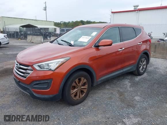 2016 Hyundai Santa Fe with VIN 5XYZTDLB4GG352635, listed as a IAAI auction lot 43173824 with Not provided miles and . Bid and sale history available at DreamBid. Image 2.
