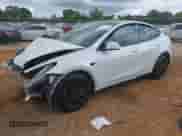 2022 Tesla Model Y Long Range z VIN 7SAYGDEE2NF385910, wystawiony jako IAAI lot #42146793 z przebiegiem 67 604 mil mil oraz . Historia ofert i sprzedaży dostępna na DreamBid. Obrazek 2.