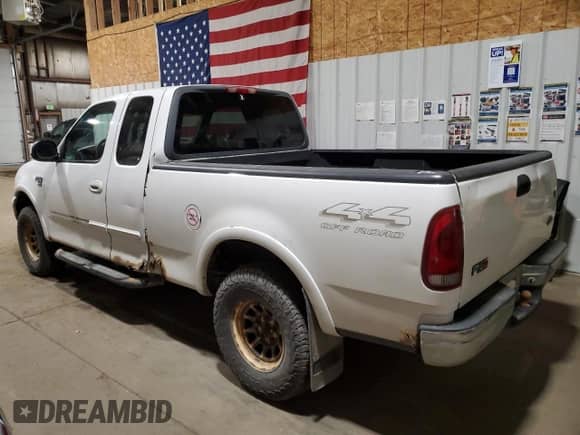 2000 Ford F-150 XL with VIN 2FTRX18L8YCA13686, listed as a Copart auction lot 85730055 with Not provided miles and Clean title. Bid and sale history available at DreamBid. Image 2.
