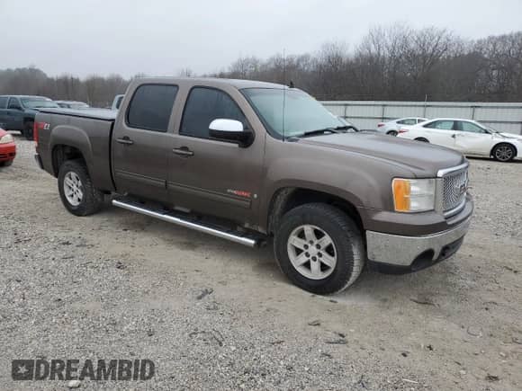 2007 GMC Sierra 1500 z VIN 2GTEK13Y671661974, wystawiony jako Copart lot #43061085 z przebiegiem 193 085 mil mil oraz Czysty tytuł • Clean title. Historia ofert i sprzedaży dostępna na DreamBid. Obrazek 4.