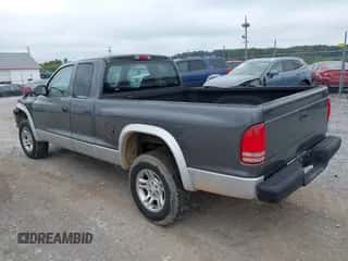 2003 Dodge Dakota SLT with VIN 1D7HG42N43S297223, listed as a IAAI auction lot 43267825 with 159,794 mi miles and . Bid and sale history available at DreamBid. Image 3.
