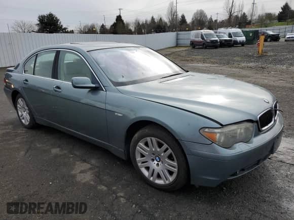 2002 BMW 7 Series 745i with VIN WBAGL63472DP56408, listed as a Copart auction lot 43949925 with 92,755 mi miles and Salvage title. Bid and sale history available at DreamBid. Image 4.