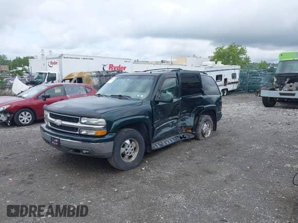 2002 Chevrolet Tahoe LT with VIN 1GNEK13Z82J242927, listed as a IAAI auction lot 42451647 with 221,646 mi miles and . Bid and sale history available at DreamBid. Image 2.