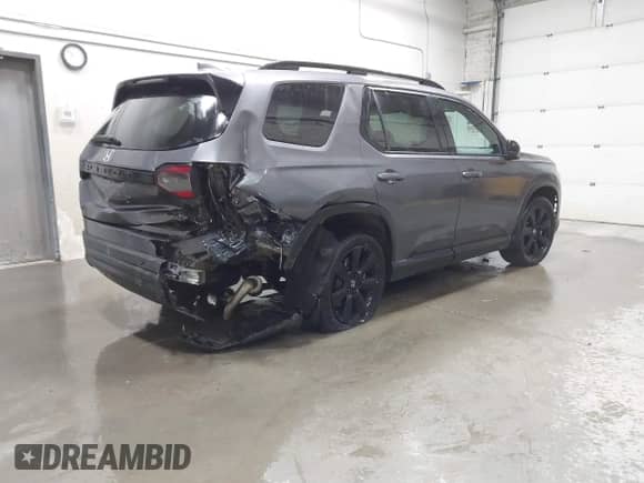 2025 Honda Pilot Black Edition с VIN 5FNYG1H91SB034976, выставлен на аукционе IAAI как лот 41677687 с пробегом 5 659 миль миль и . История ставок и продаж доступна на DreamBid. Изображение 4.