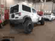 2012 Jeep Wrangler Arctic with VIN 1C4AJWBG9CL233232, listed as a IAAI auction lot 42282805 with 109,927 mi miles and . Bid and sale history available at DreamBid. Image 4.