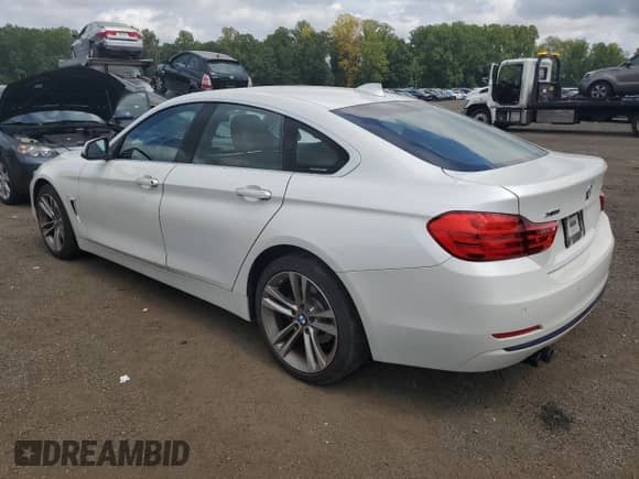 2016 BMW 4 Series 428i xDrive z VIN WBA4C9C51GG136270, wystawiony jako Copart lot #67798155 z przebiegiem 65 597 mil mil oraz Szkoda całkowita • Salvage title. Historia ofert i sprzedaży dostępna na DreamBid. Obrazek 2.