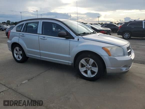 2012 Dodge Caliber SXT с VIN 1C3CDWDA5CD533597, выставлен на аукционе Copart как лот 73834484 с пробегом 94 908 миль миль и Списание • Salvage title. История ставок и продаж доступна на DreamBid. Изображение 4.