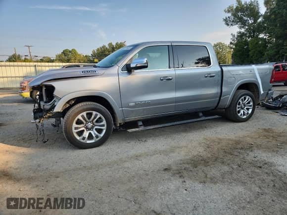 2020 Ram 1500 Longhorn with VIN 1C6SRFKT0LN388709, listed as a Copart auction lot 81114635 with 82,592 mi miles and Salvage title. Bid and sale history available at DreamBid. Image 1.