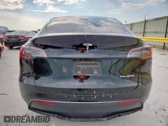 2023 Tesla Model Y Long Range with VIN 7SAYGAEE9PF708142, listed as a Copart auction lot 71913875 with 44,830 mi miles and Salvage title. Bid and sale history available at DreamBid. Image 6.