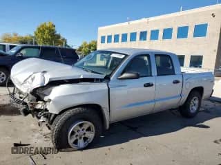 2008 Dodge Dakota with VIN 1D3HW38N38S581682, listed as a Copart auction lot 77111094 with 173,724 mi miles and Salvage title. Bid and sale history available at DreamBid. Image 1.