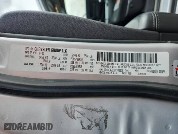 2011 Dodge Durango Crew z VIN 1D4RE4GG3BC742318, wystawiony jako Copart lot #86108785 z przebiegiem 225 941 mil mil oraz Szkoda całkowita • Salvage title. Historia ofert i sprzedaży dostępna na DreamBid. Obrazek 13.