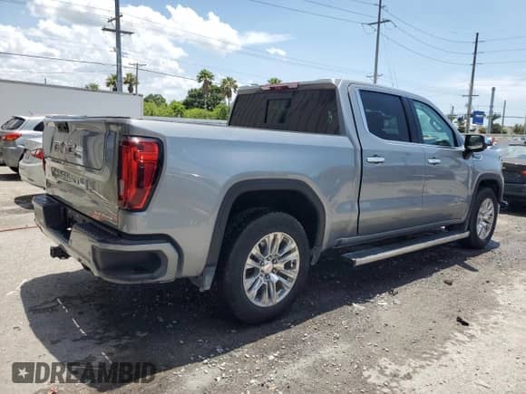 2023 GMC Sierra 1500 Denali z VIN 1GTUUGED7PZ270231, wystawiony jako Copart lot #58398935 z przebiegiem 14 572 mil mil oraz Nie do naprawy • Non repairable. Historia ofert i sprzedaży dostępna na DreamBid. Obrazek 3.