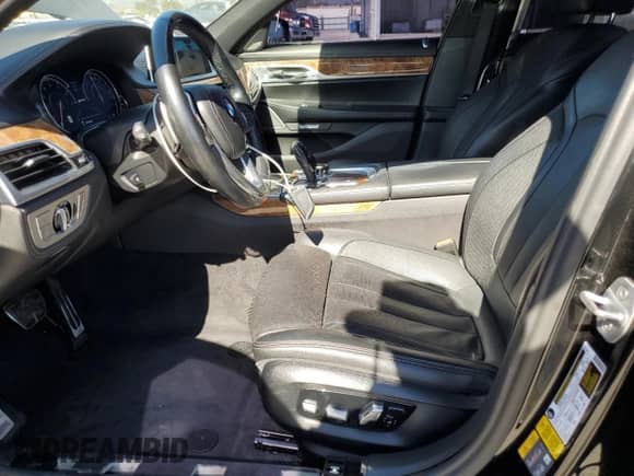 2018 BMW 7 Series 740e xDrive with VIN WBA7J2C50JG938505, listed as a Copart auction lot 50485725 with 94,535 mi miles and Salvage title. Bid and sale history available at DreamBid. Image 7.