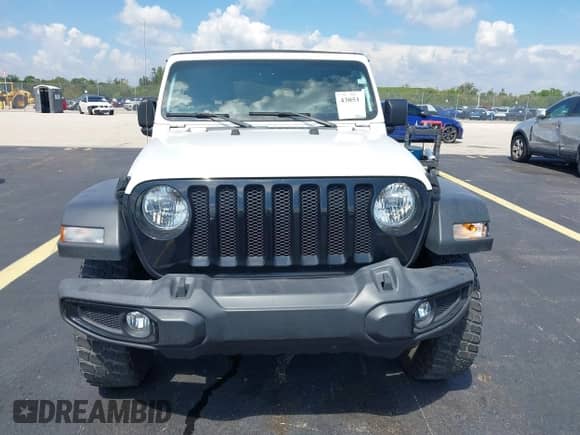 2021 Jeep Wrangler Sport S with VIN 1C4GJXAN4MW804495, listed as a IAAI auction lot 43051939 with 36,306 mi miles and . Bid and sale history available at DreamBid. Image 12.