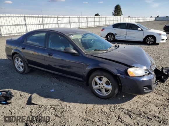 2006 Dodge Stratus SXT with VIN 1B3EL46R46N185788, listed as a Copart auction lot 71580104 with 104,390 mi miles and Salvage title. Bid and sale history available at DreamBid. Image 4.
