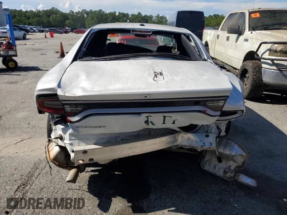 2023 Dodge Charger Police z VIN 2C3CDXAT6PH581176, wystawiony jako Copart lot #65977865 z przebiegiem Nie podano mil oraz Szkoda całkowita • Salvage title. Historia ofert i sprzedaży dostępna na DreamBid. Obrazek 6.