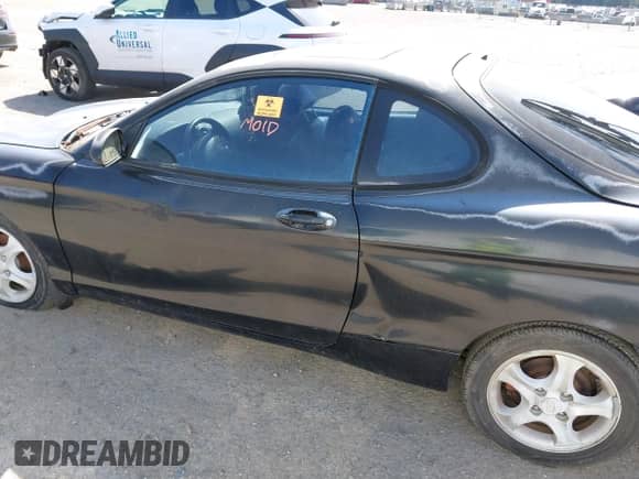 2000 Hyundai Tiburon с VIN KMHJG35F5YU191588, выставлен на аукционе IAAI как лот 41934653 с пробегом 161 590 миль миль и . История ставок и продаж доступна на DreamBid. Изображение 6.