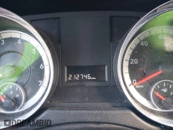 2013 Dodge Grand Caravan SE with VIN 2C4RDGBGXDR791339, listed as a IAAI auction lot 43387058 with 212,746 mi miles and . Bid and sale history available at DreamBid. Image 7.