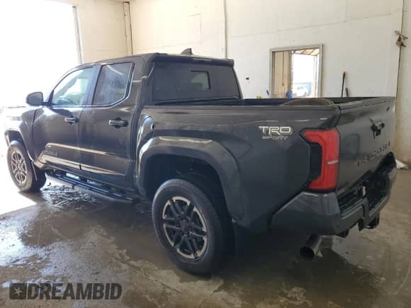 2024 Toyota Tacoma SR5 with VIN 3TMLB5JN6RM022769, listed as a Copart auction lot 85087965 with 17,767 mi miles and Salvage title. Bid and sale history available at DreamBid. Image 2.