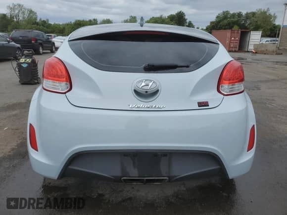 2015 Hyundai Veloster z VIN KMHTC6AD5FU223446, wystawiony jako Copart lot #69798925 z przebiegiem 81 772 mil mil oraz Szkoda całkowita • Salvage title. Historia ofert i sprzedaży dostępna na DreamBid. Obrazek 6.