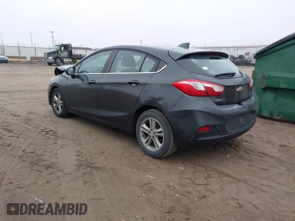 2017 Chevrolet Cruze LT z VIN 3G1BE6SM3HS548584, wystawiony jako IAAI lot #41208267 z przebiegiem 105 807 mil mil oraz . Historia ofert i sprzedaży dostępna na DreamBid. Obrazek 3.