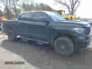 2021 Toyota Tundra SR5 with VIN 5TFDY5F10MX964425, listed as a IAAI auction lot 41843735 with 108,005 mi miles and . Bid and sale history available at DreamBid. Image 1.