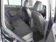 2011 Volkswagen Tiguan SE with VIN WVGAV7AX1BW549681, listed as a IAAI auction lot 40772939 with 157,547 mi miles and . Bid and sale history available at DreamBid. Image 8.